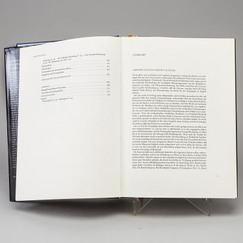 A set of 5 watch books.