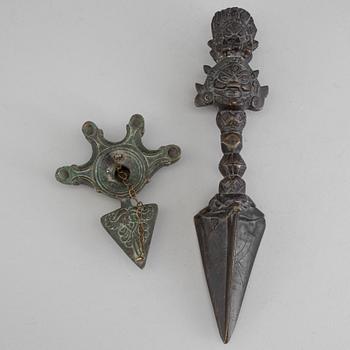 An early 20th century Tibetian bronze Phurba (ritual dagger) and censor.