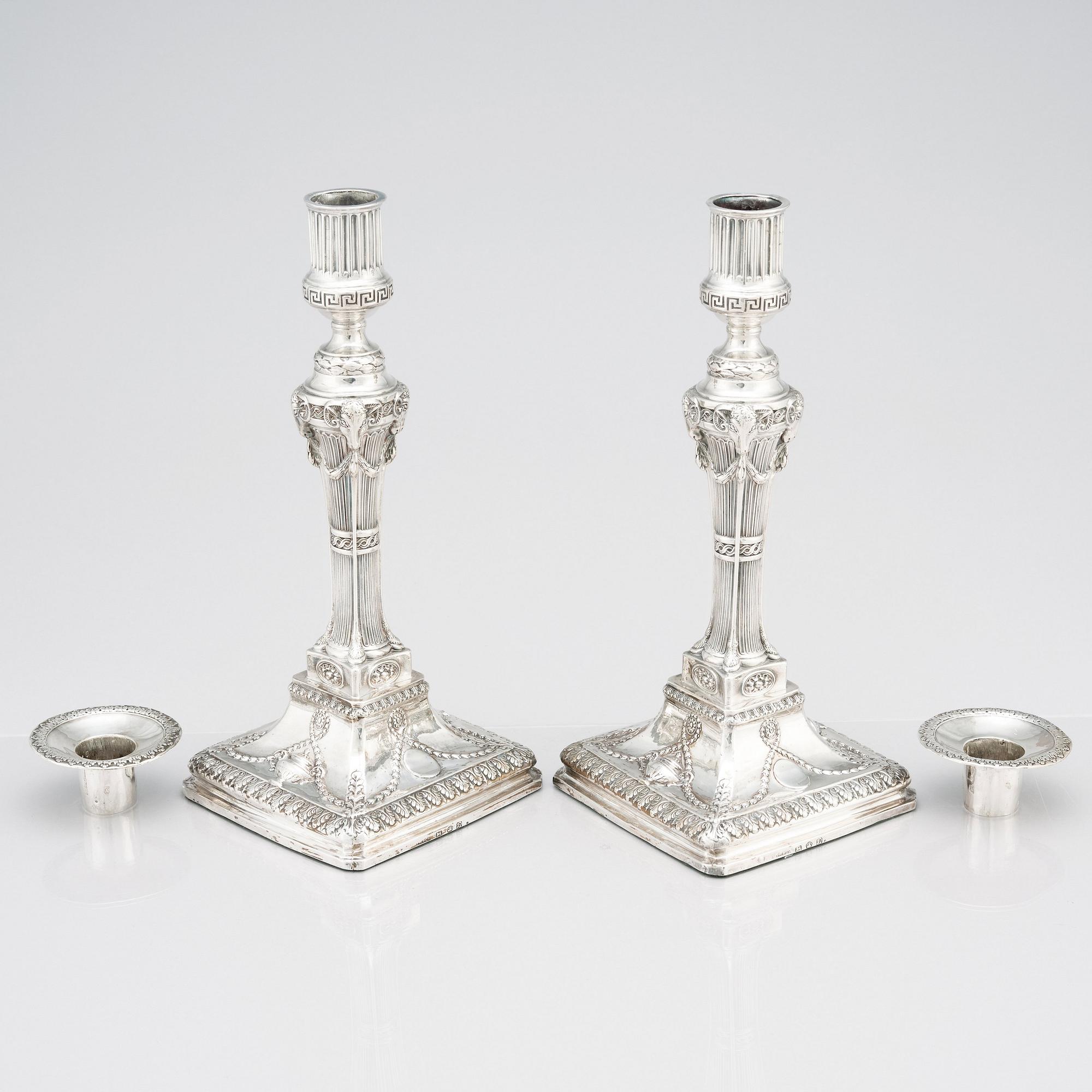 An English pair of 18th Century silver candlesticks, mark of John Winter & Co, Sheffield 1775.