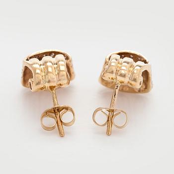 Korvakorut, 14K kultaa ja timantteja.