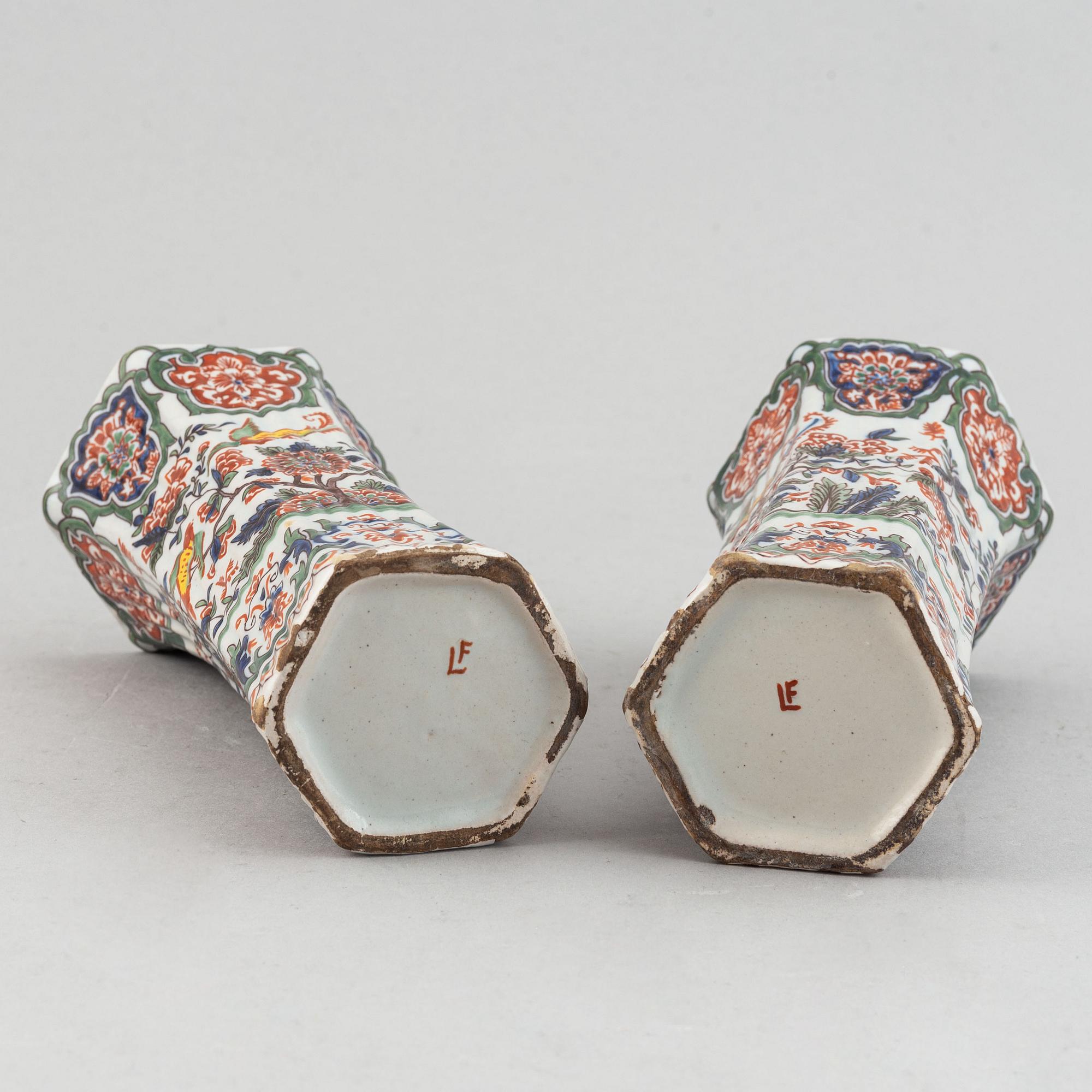 A five piece french faience garniture.