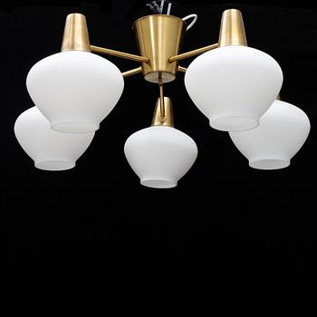 A mid 20th Century brass and glass ceiling light from Asea.