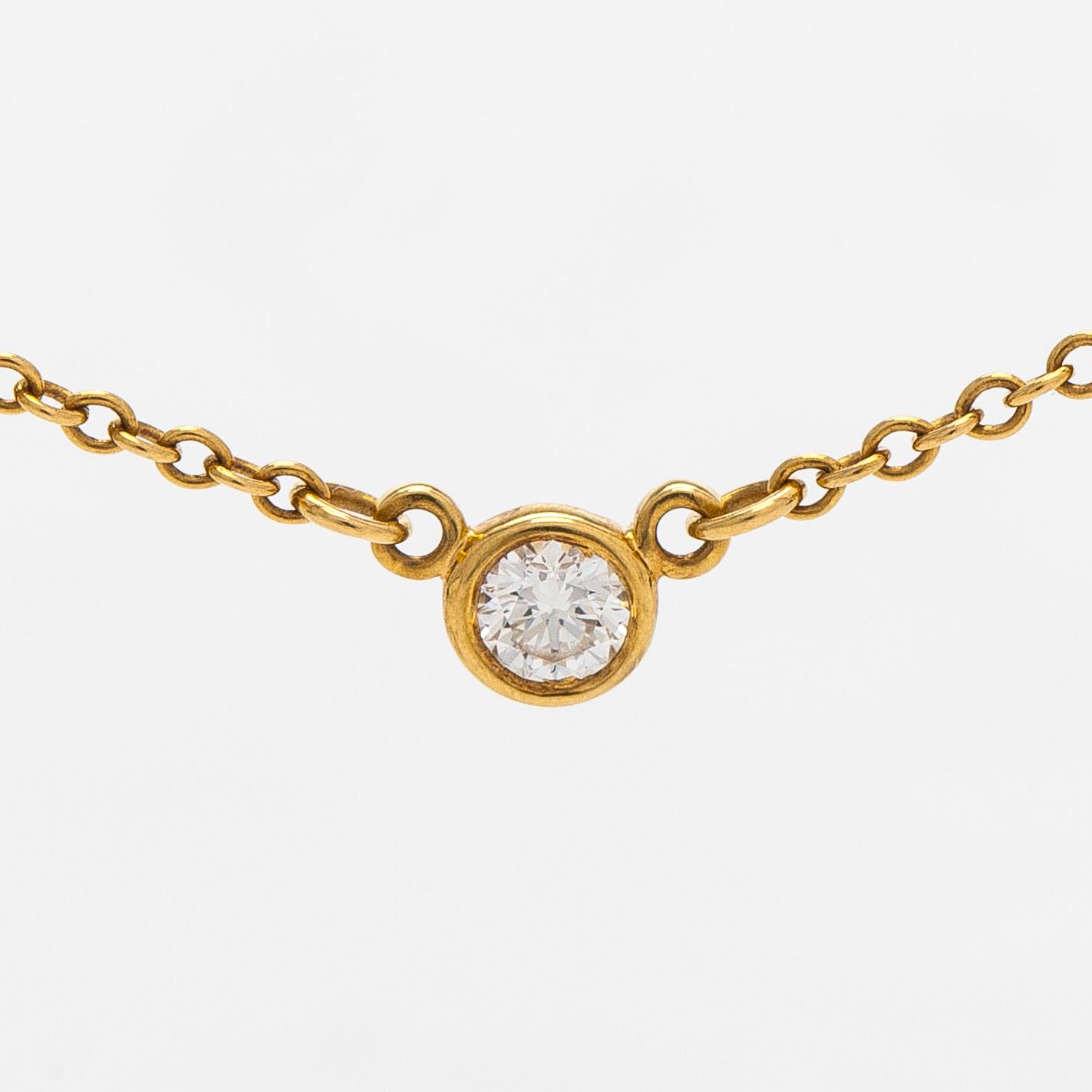 Tiffany & Co, Elsa Peretti, an 18K gold 'Diamonds by the Yard' necklace with a brilliant-cut diamond.