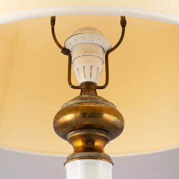 A glass and brass table lamp, mid/second half of the 20th century.