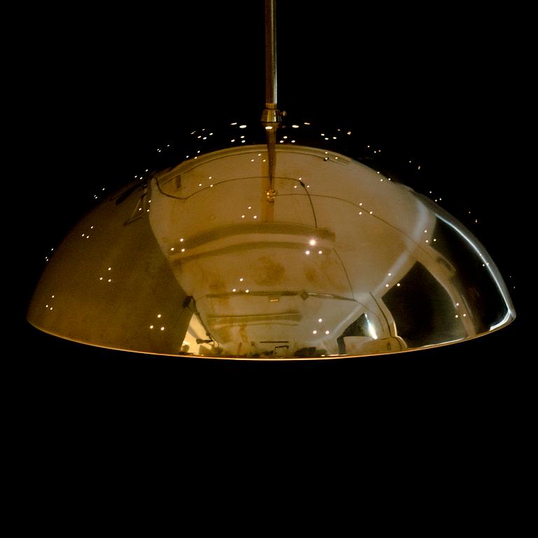 A mid 20th century pendant light for Taito Finland.