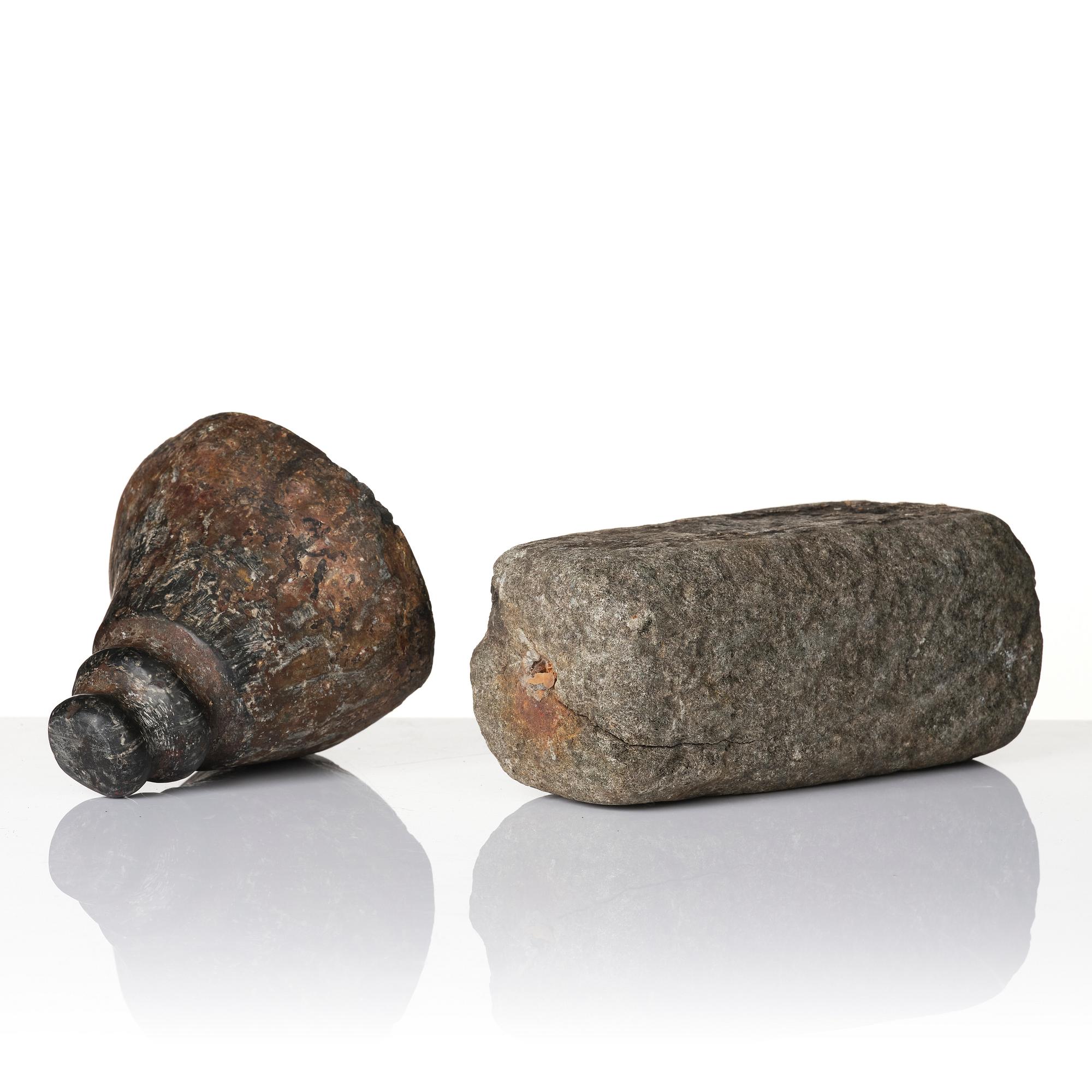 Two stone pigment graters, 18th / 19th century.