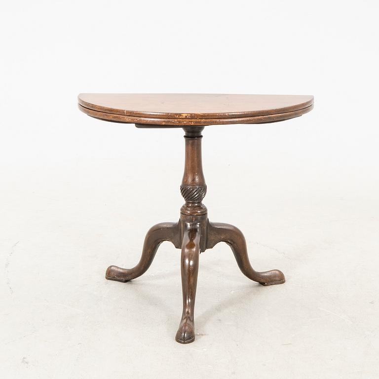 An English Queen Anne mahogany folding table 18th century.