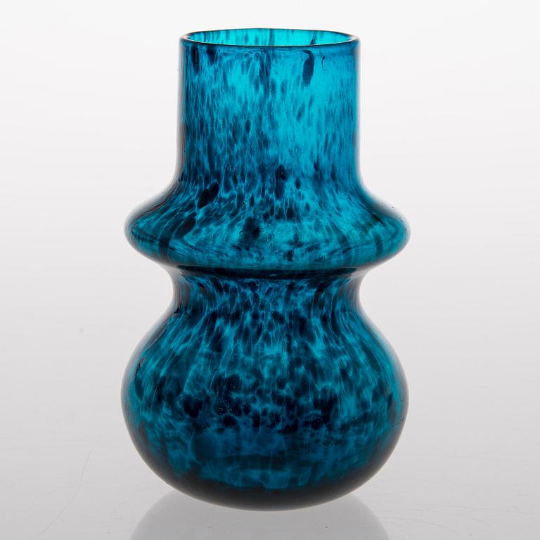 a turquoise glass vase.