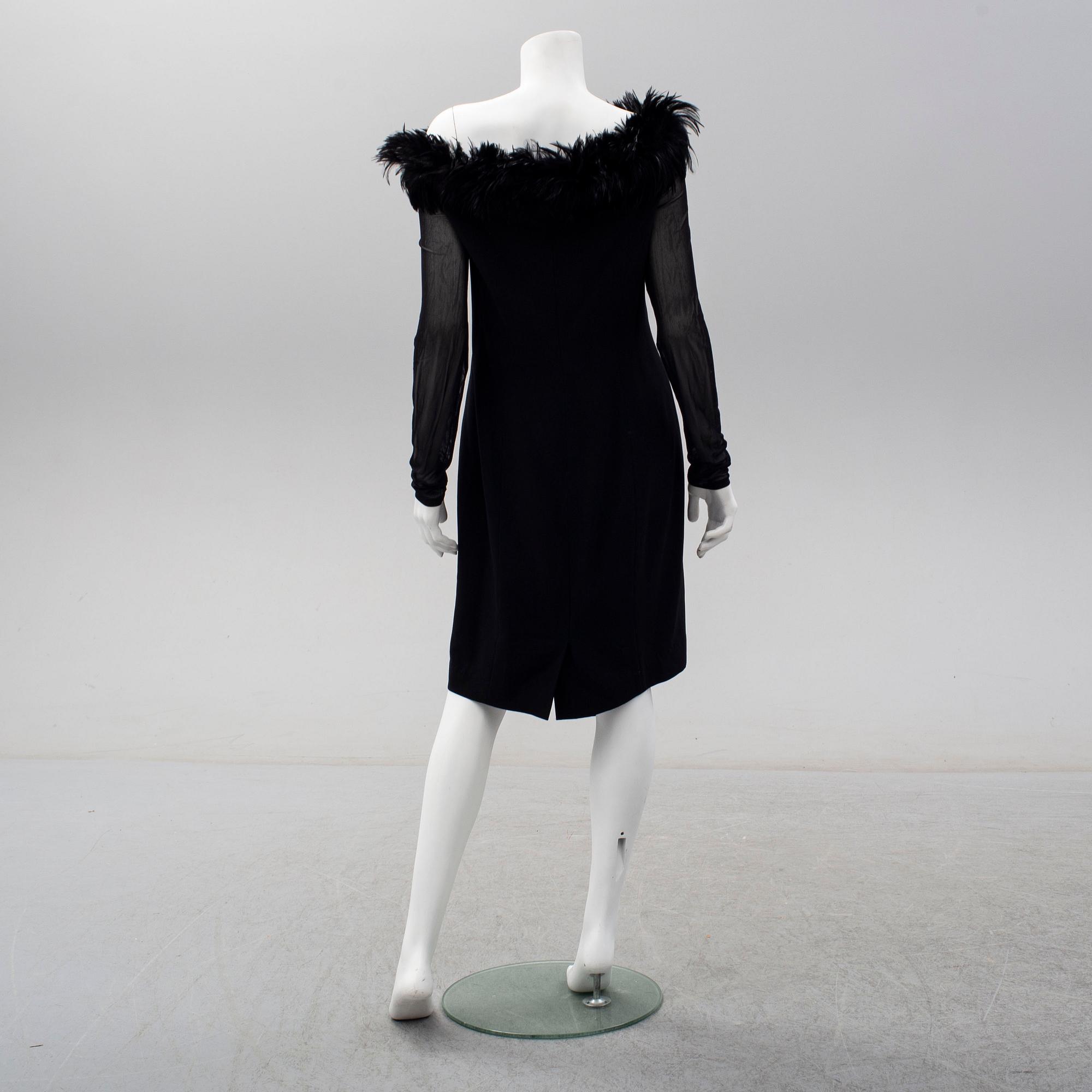 ESCADA COUTURE, a wool dress with feather collar, size 40.