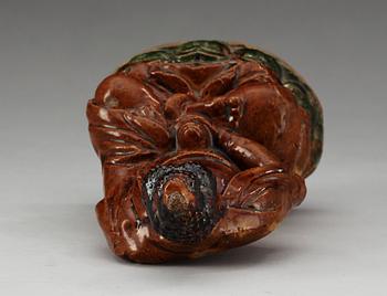 A ceramic figure of Buddha, Ming dynasty, 17th Century.