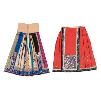 947. Two embroidered silk skirts, late Qing dynasty.