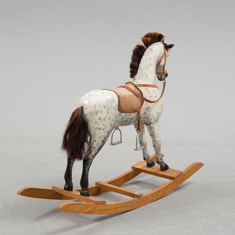 A circa 1900 rocking horse.