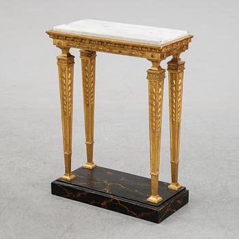 An early 19th Century console table.
