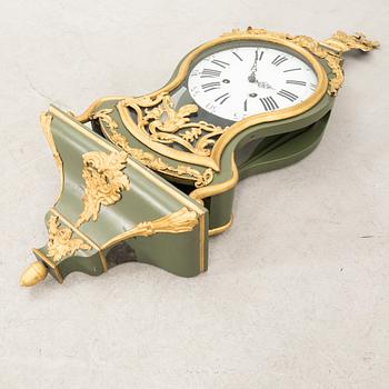 Mantel clock with console, Rococo style, 19th century.