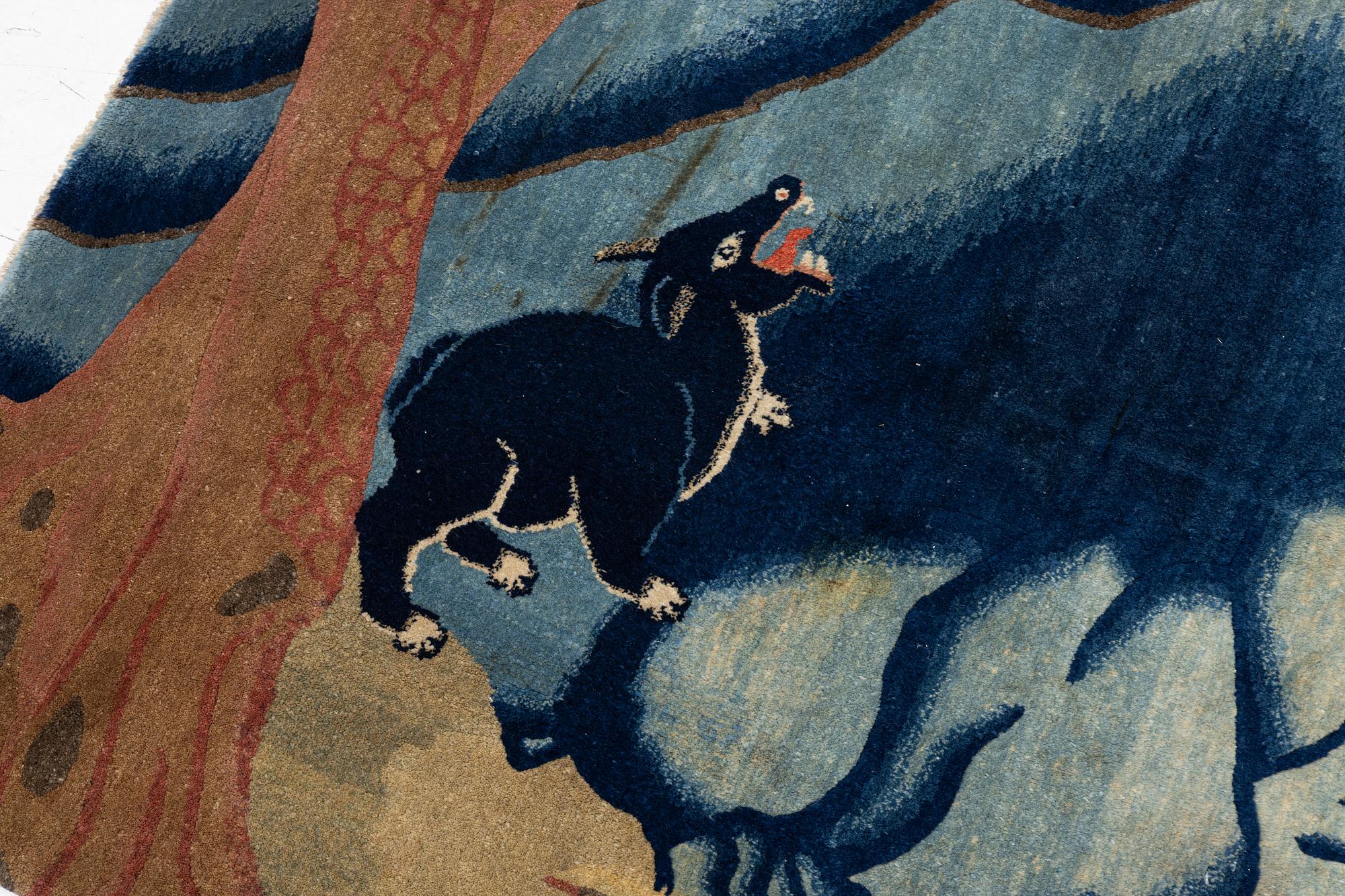 An antique Baotou rug, northern China, late Qing dynasty, around 1900. c. 252x151 cm.