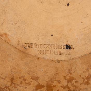 One eathenware bowl and two plates.