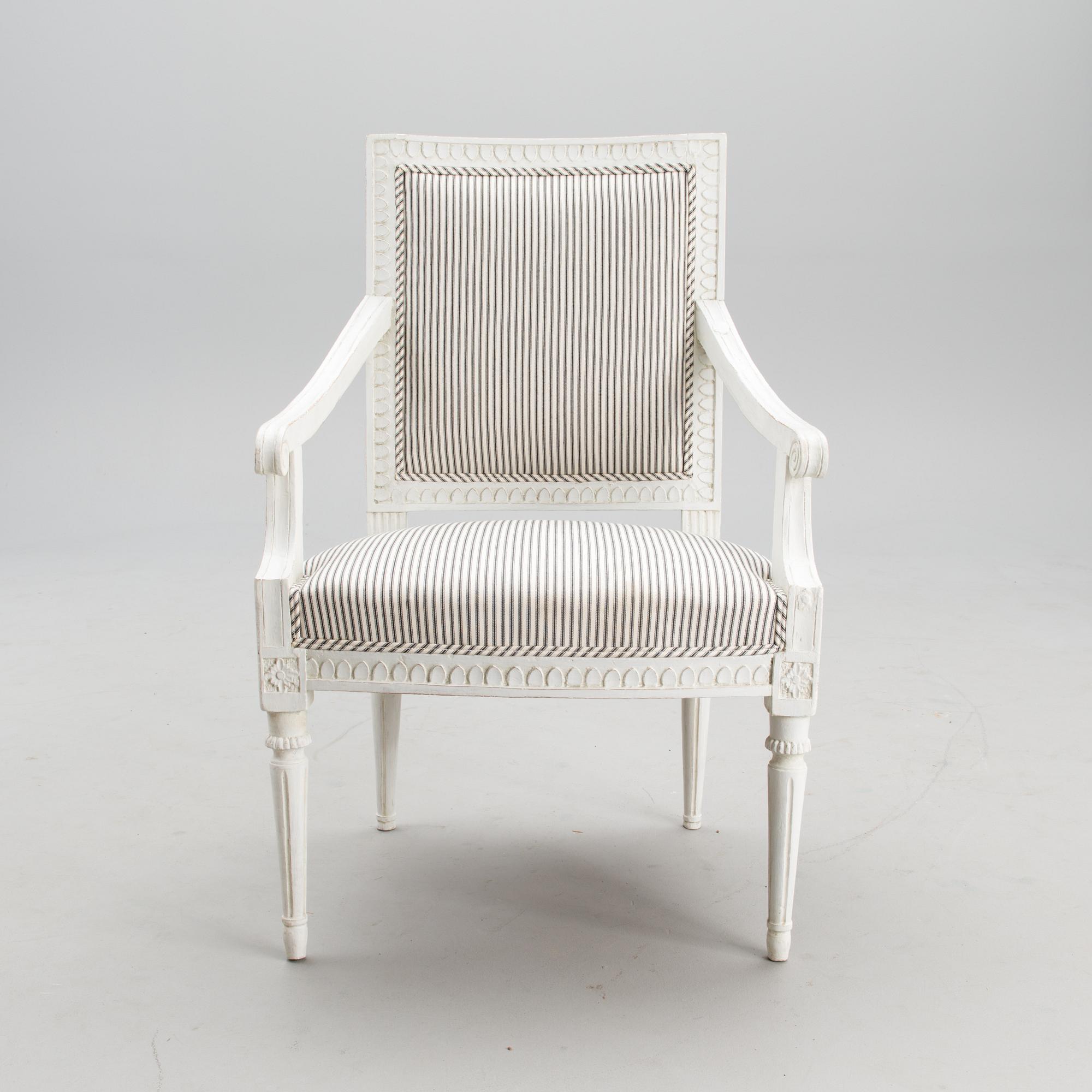 A late 18th century Swedidh Gustavian open arm chair.