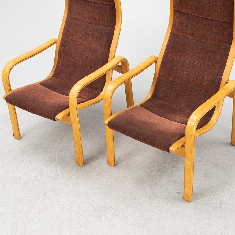 Yngve Ekström, a pair of armchairs, Swedese, late 20th century.