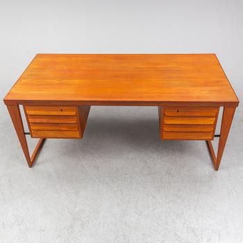 A 1960's teak model 70 writing desk by Kai Kristiansen.