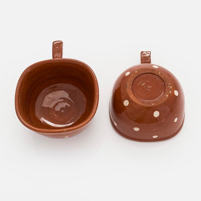 Marita Lybeck, koppar, 2 st, rödlera, signerad ML.