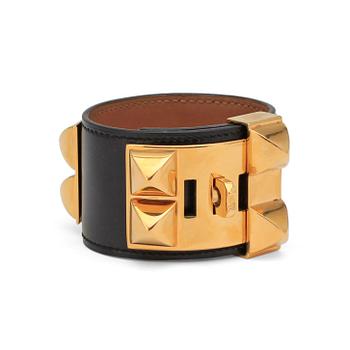 HERMÈS, a black "Collier de Chien" bracelet.