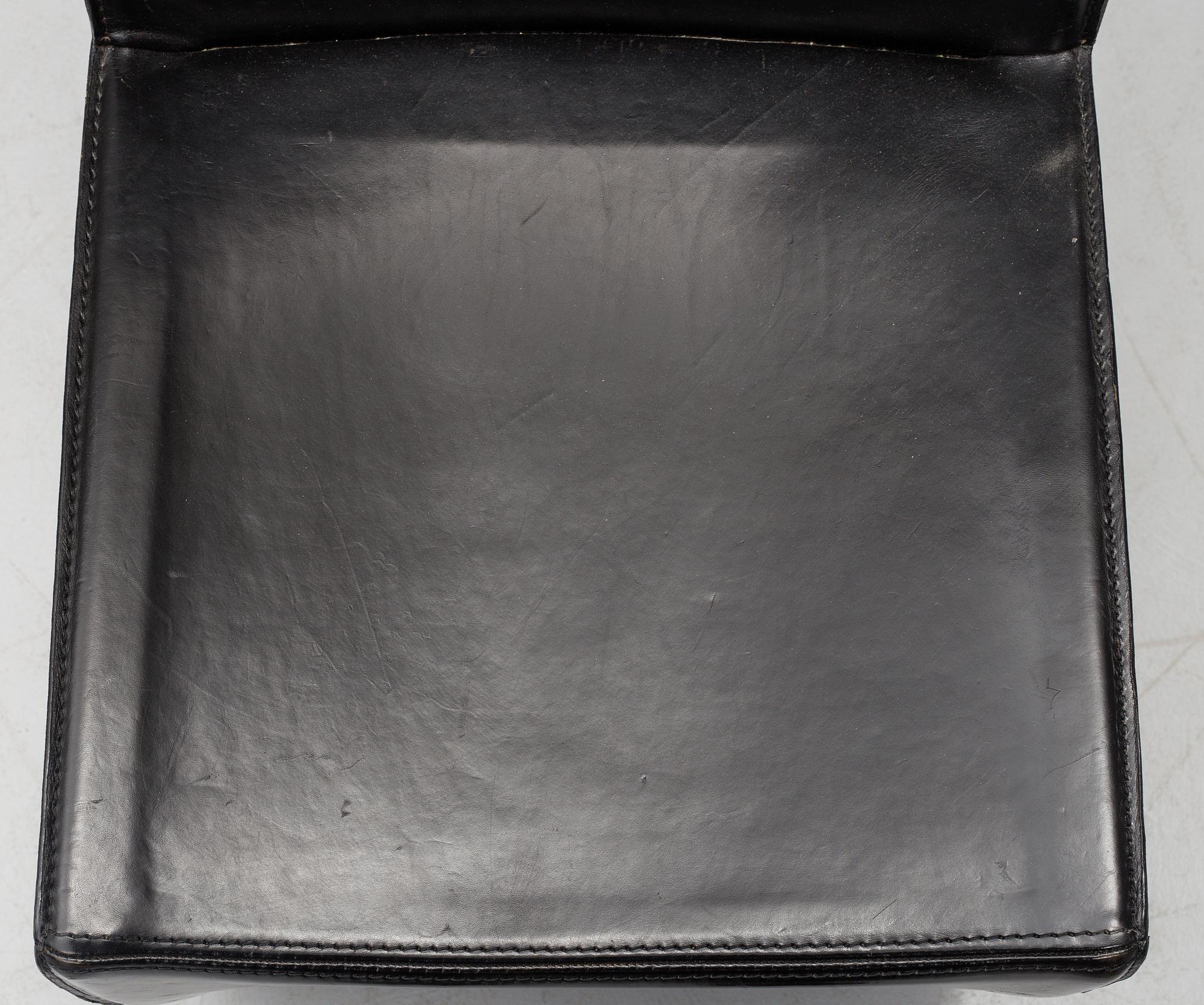 A Philippe Starck 'J Serie Lang' black leather and cast aluminium lounge chair, by Aleph, Italy.