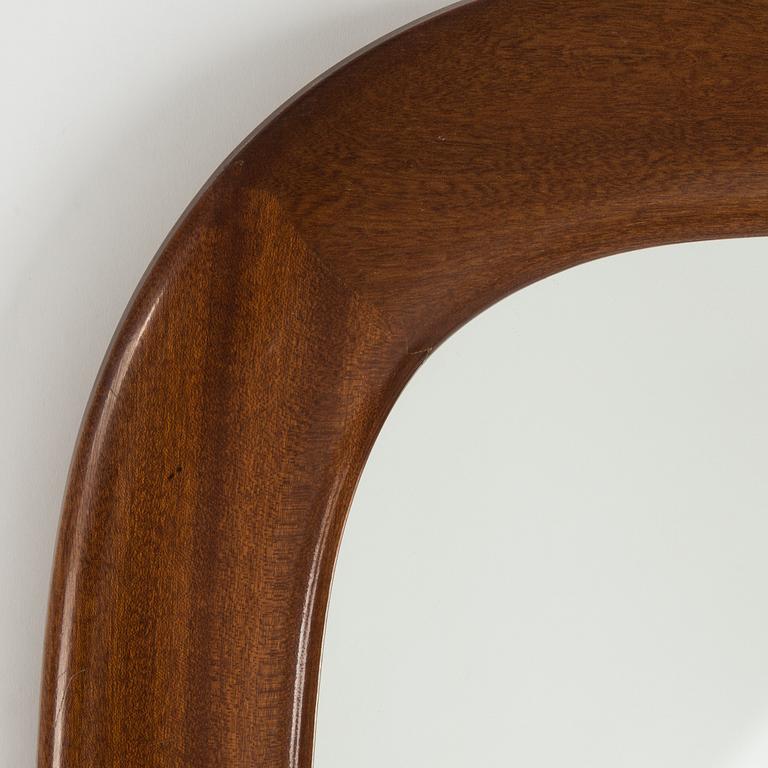 A Swedish Modern mahogany mirror from Glas&Trä, Hovmantorp, dated 1957.