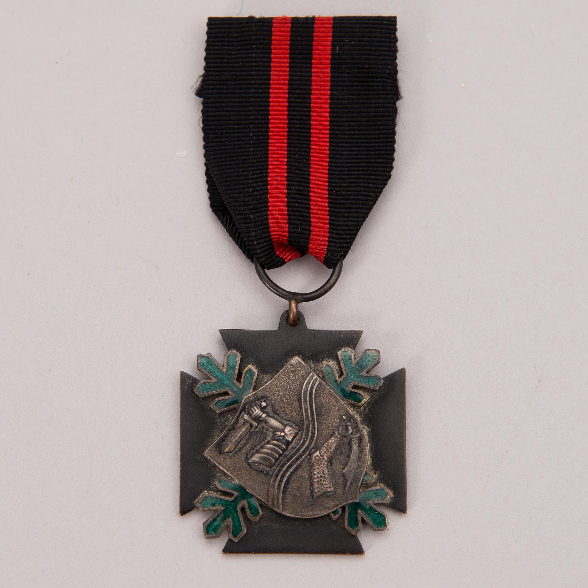 A mid 20th Century Finnish Kollaa commemorative cross.