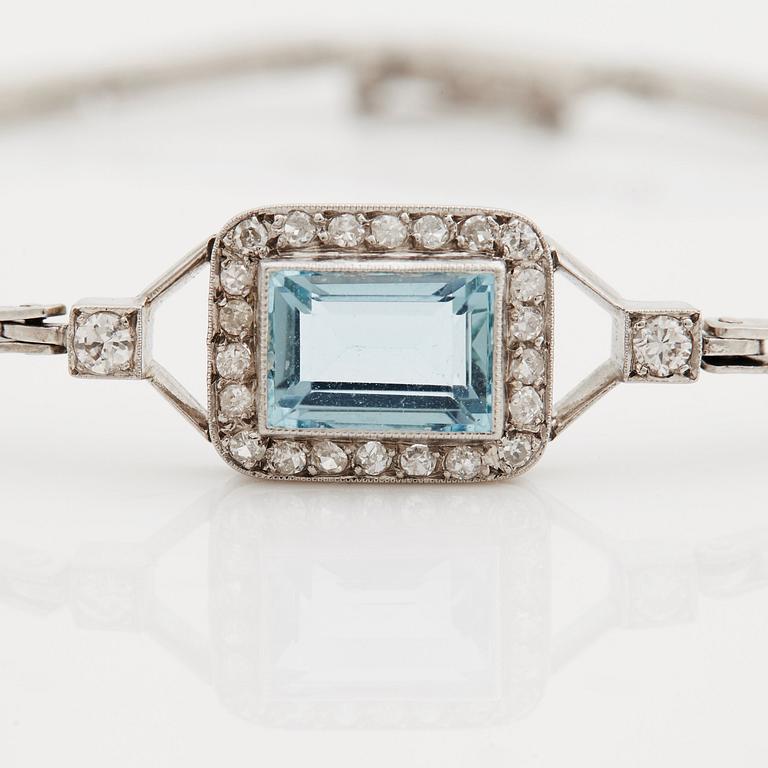 A step-cut aquamarine, old and single cut diamond bracelet.