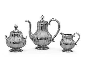 379. A TEA SERVICE, 3 parts. 84 silver Henrik Hacklin St Petersburg 1877. Weight 1352 g.