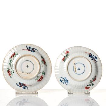 A pair of famille verte cups with stands, Qing dynasty, Kangxi (1662-1722).