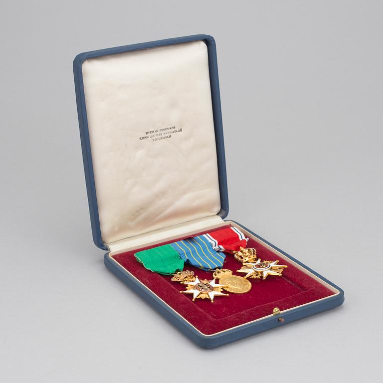 Three medals one of the Sankt Olov order, one of the Vasa order and one from the Swedish army.