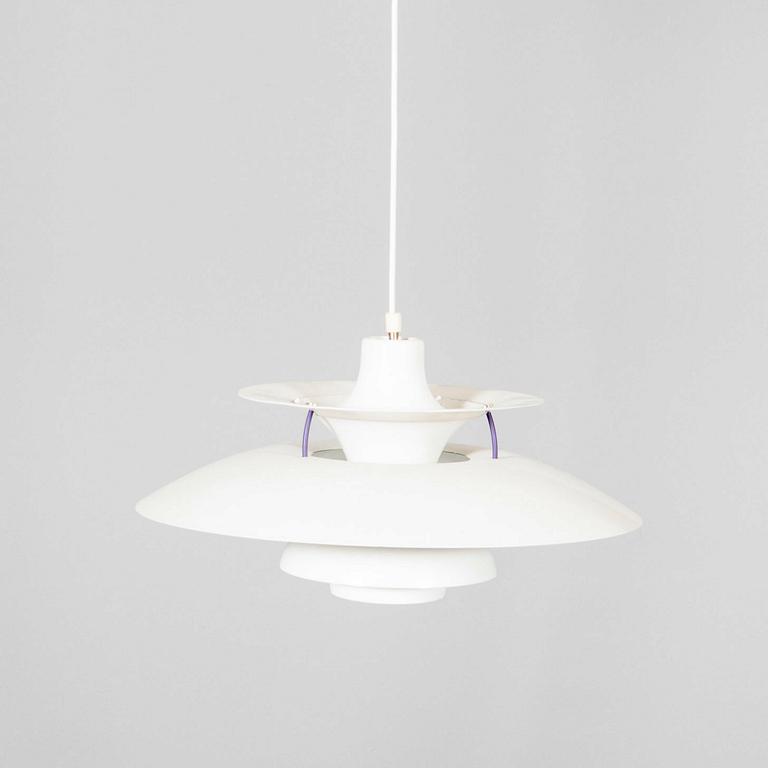 A Poul Henningsen PH5 ceiling pendant from Louis Poulsen Denmark alter part of the 20th century.