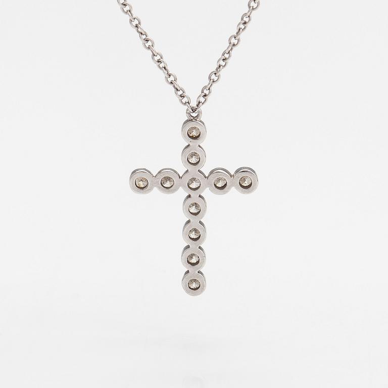 Tiffany & Co, a platinum necklace, 'Jazz Cross' with diamonds approx 0.20ct in total.