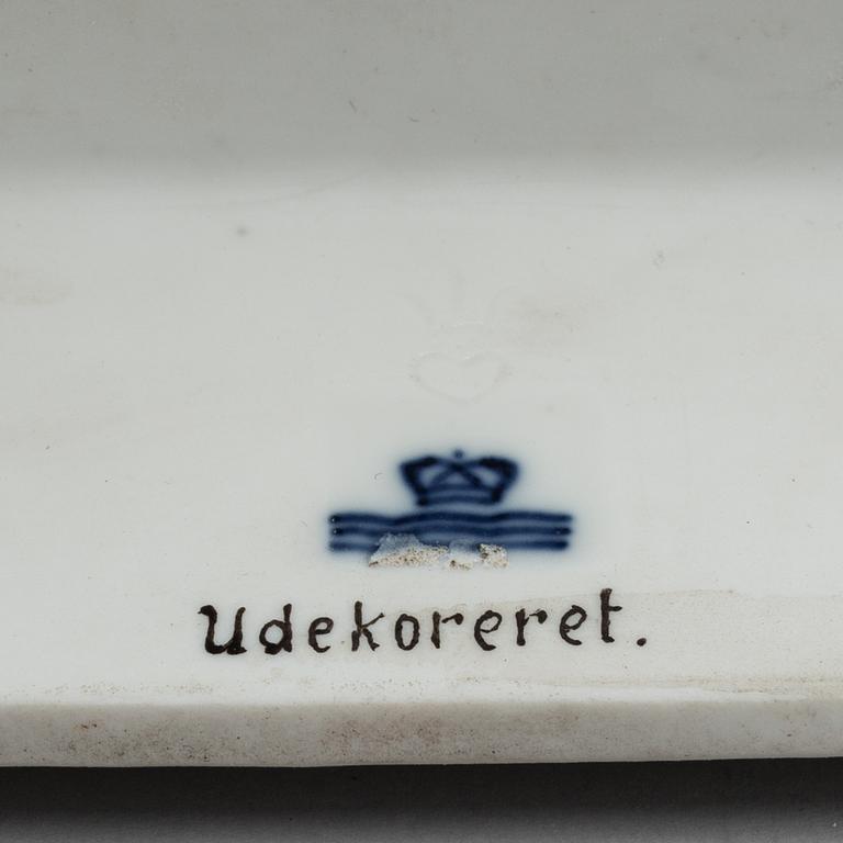 A white glazed Royal Copenhagen porcelain figure, Gerhard Henning, Danmark, 1920's.