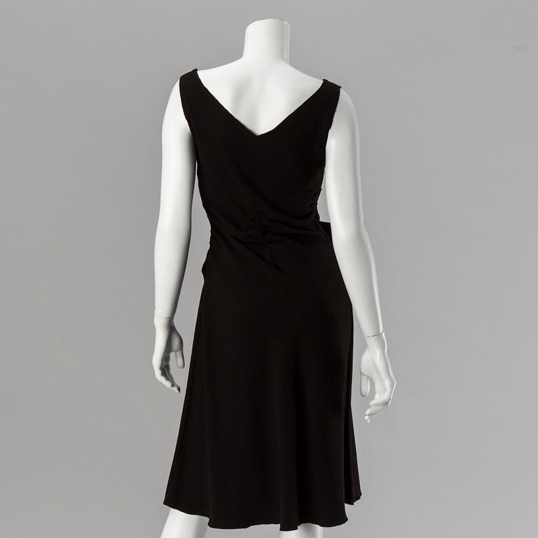 A black dress by Prada.