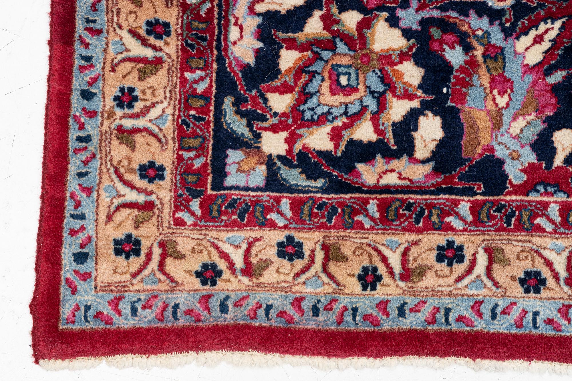 A oriental carpet, c. 375 x 290 cm.
