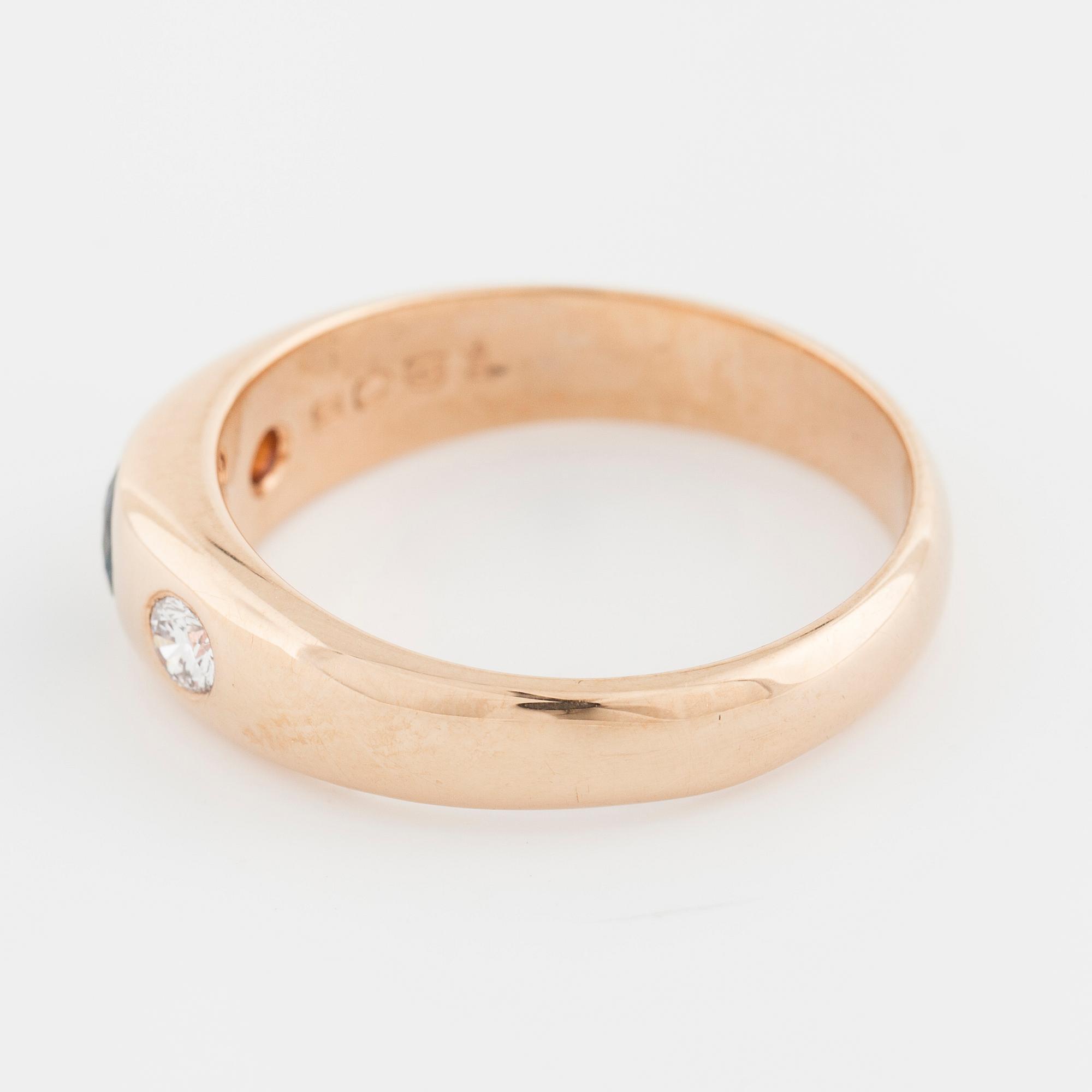 RING, med safir 0.31 ct samt två briljantslipade diamanter totalt 0.19 ct, JM Johansson, Göteborg, 1991.