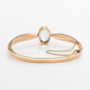 Rannerengas, viistehiottu akvamariini, 18K kultaa, Samuel Mika Westerlund, Porvoo 1927.