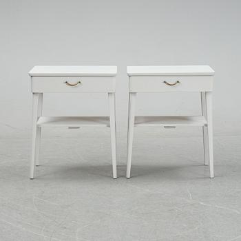 A pair of mid 20th century bedside tables.