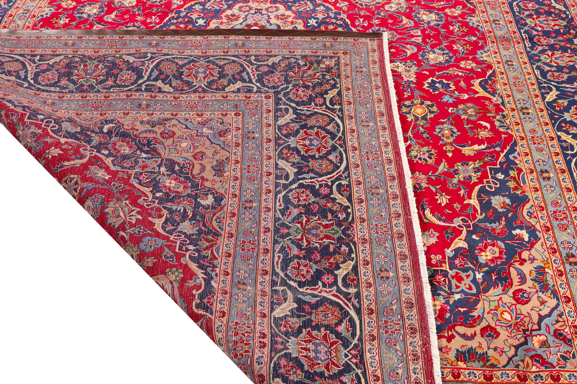 A Keshan carpet, c. 408 x 295 cm.