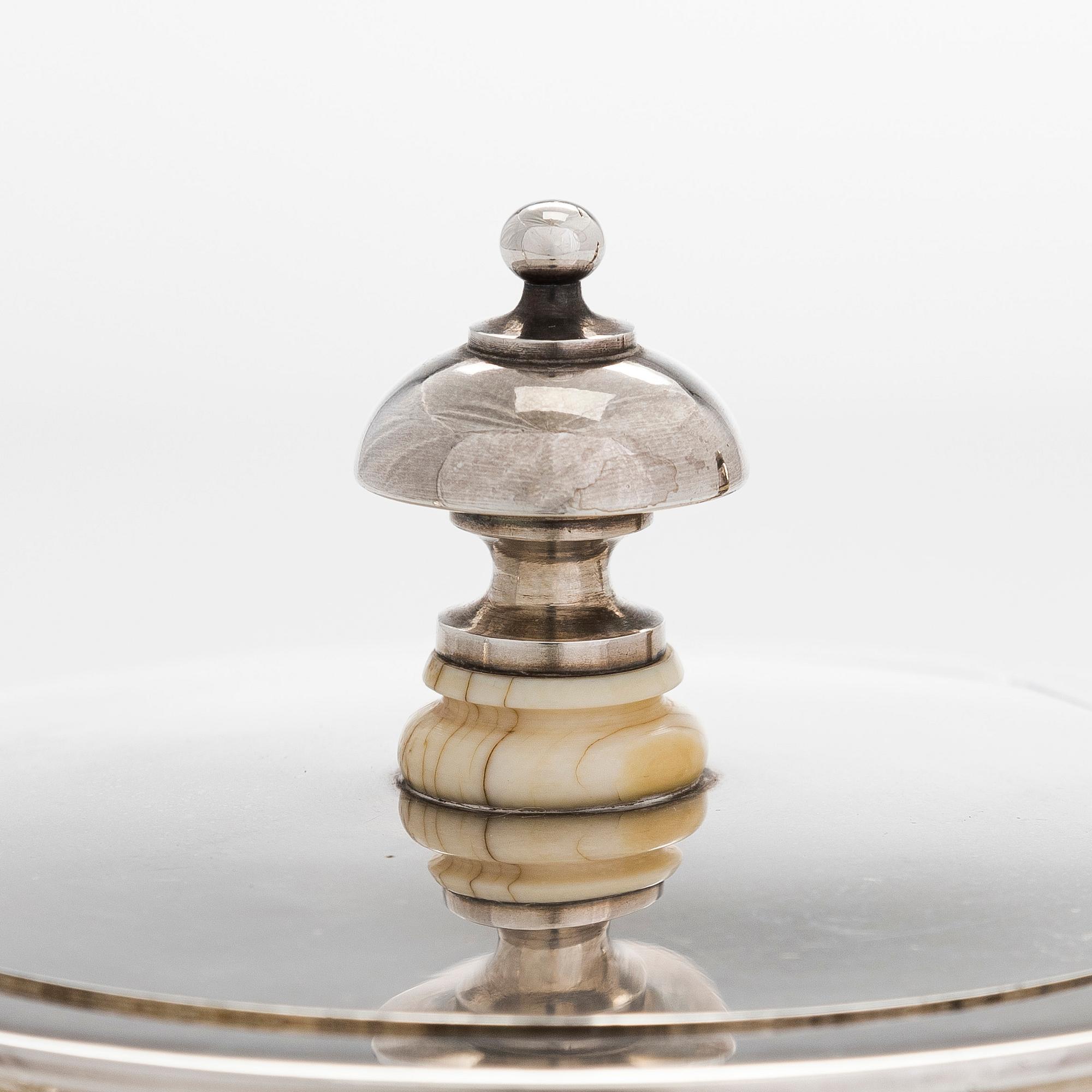A 19th-century parcel-gilt silver teapot, maker's mark of Johan Heinoin, Saint Petersburg 1878.
