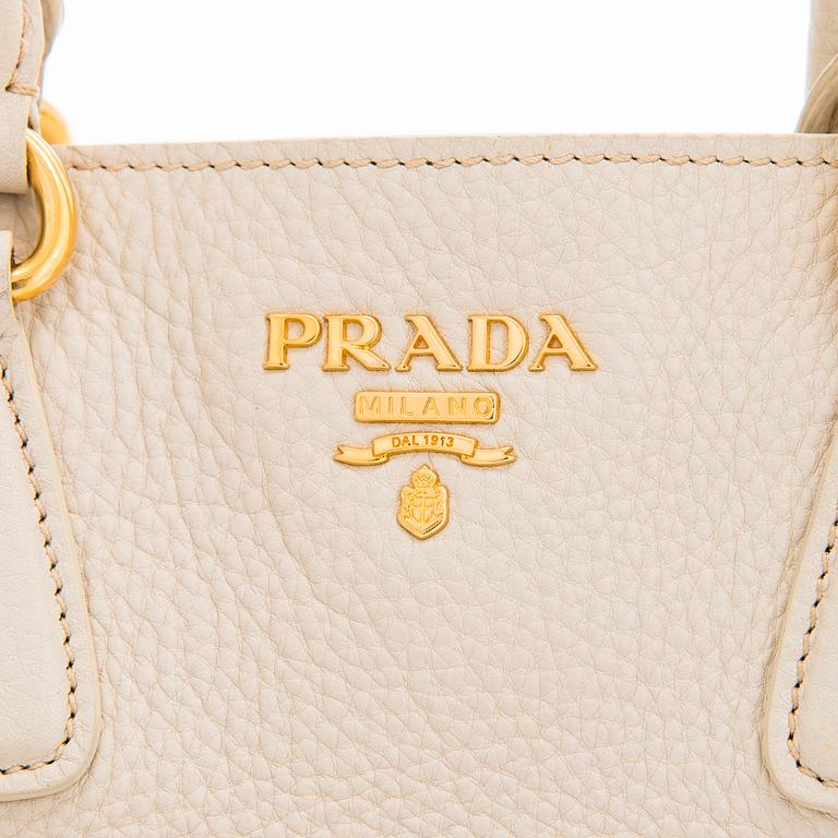 Prada, a 'Vitello Daino Tote' bag.