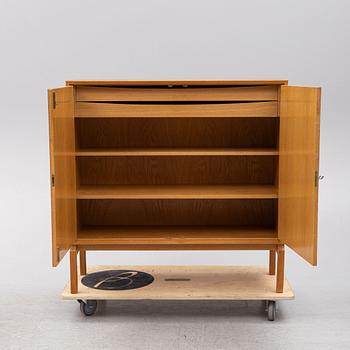 An oak cabinet, second half of the 20th century.