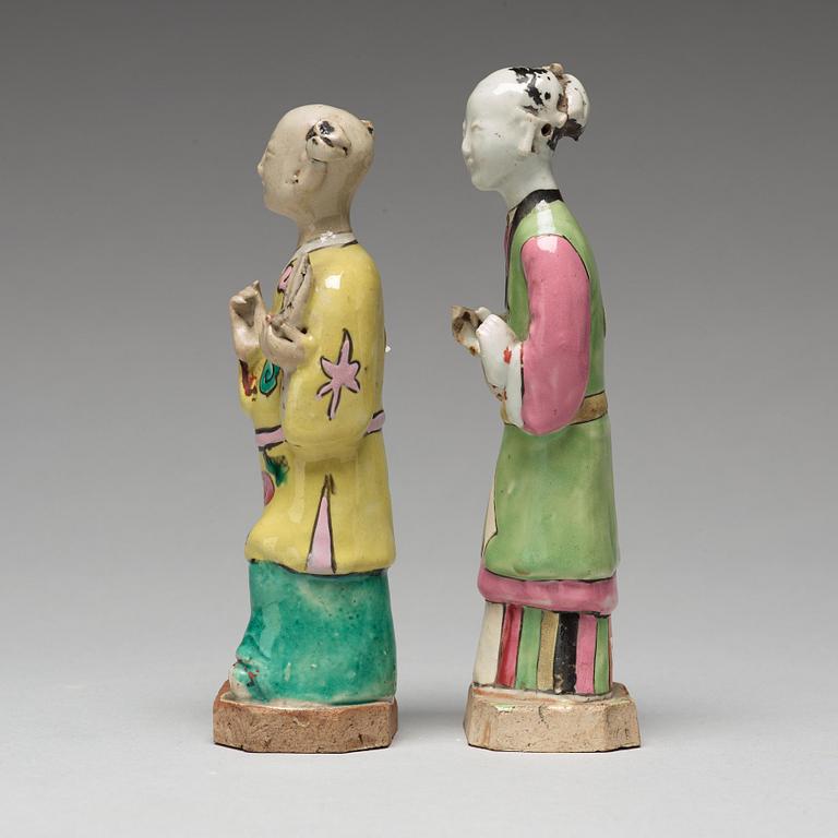 A group of eight famille rose figurines, Qing dynasty, 19th Century.