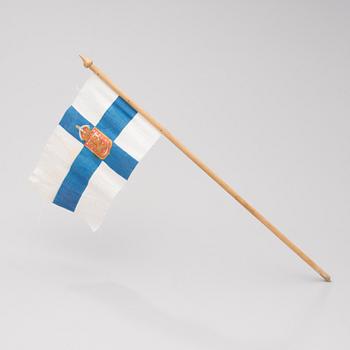 A hand flag of the 1918-20 Finnish state flag.