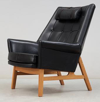 A Tove & Edvard Kindt- Larsen 'Glimminge' oak and black leather armchair, 1960's.