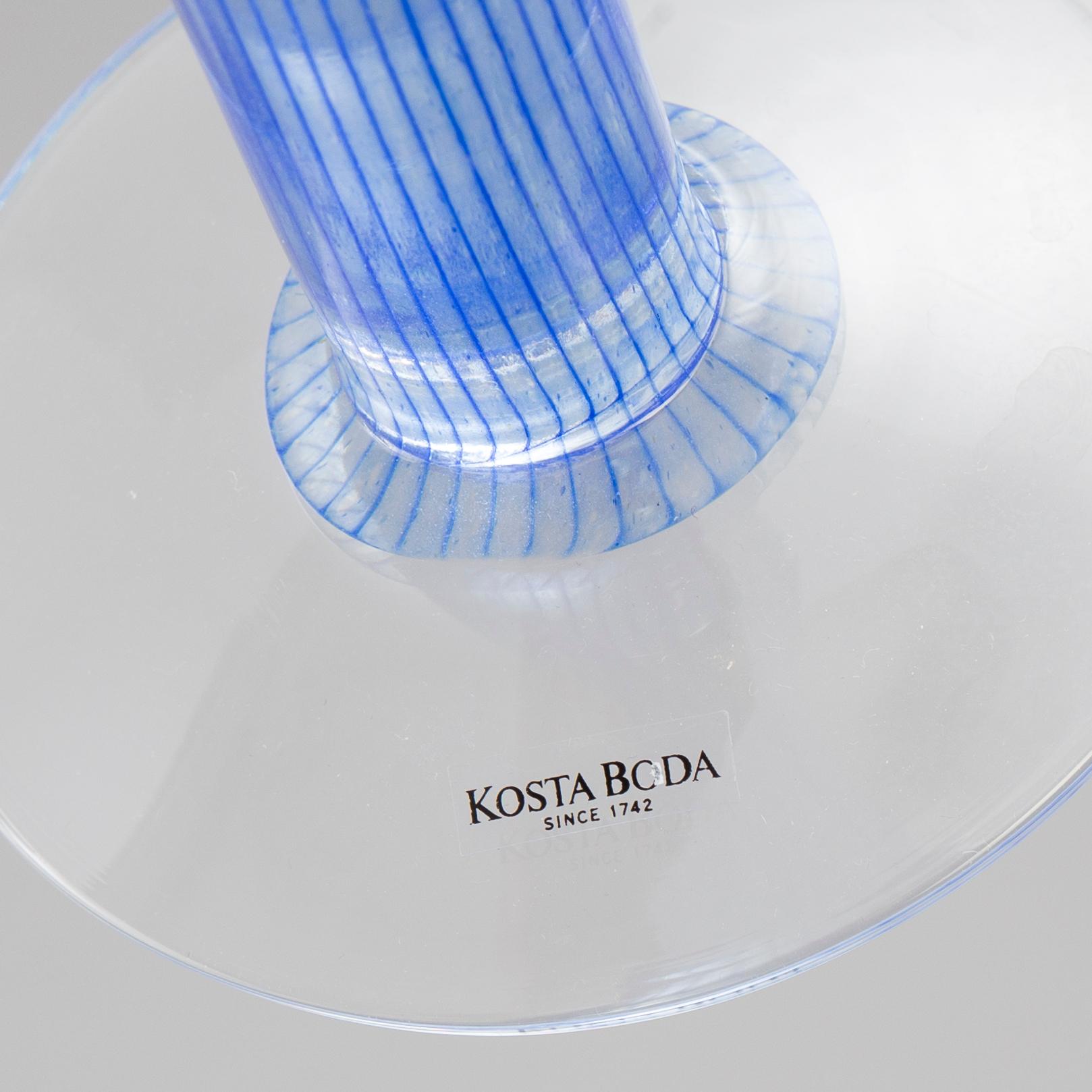 A set of five glass candlesticks by Kjell Engman för Kosta Boda.
