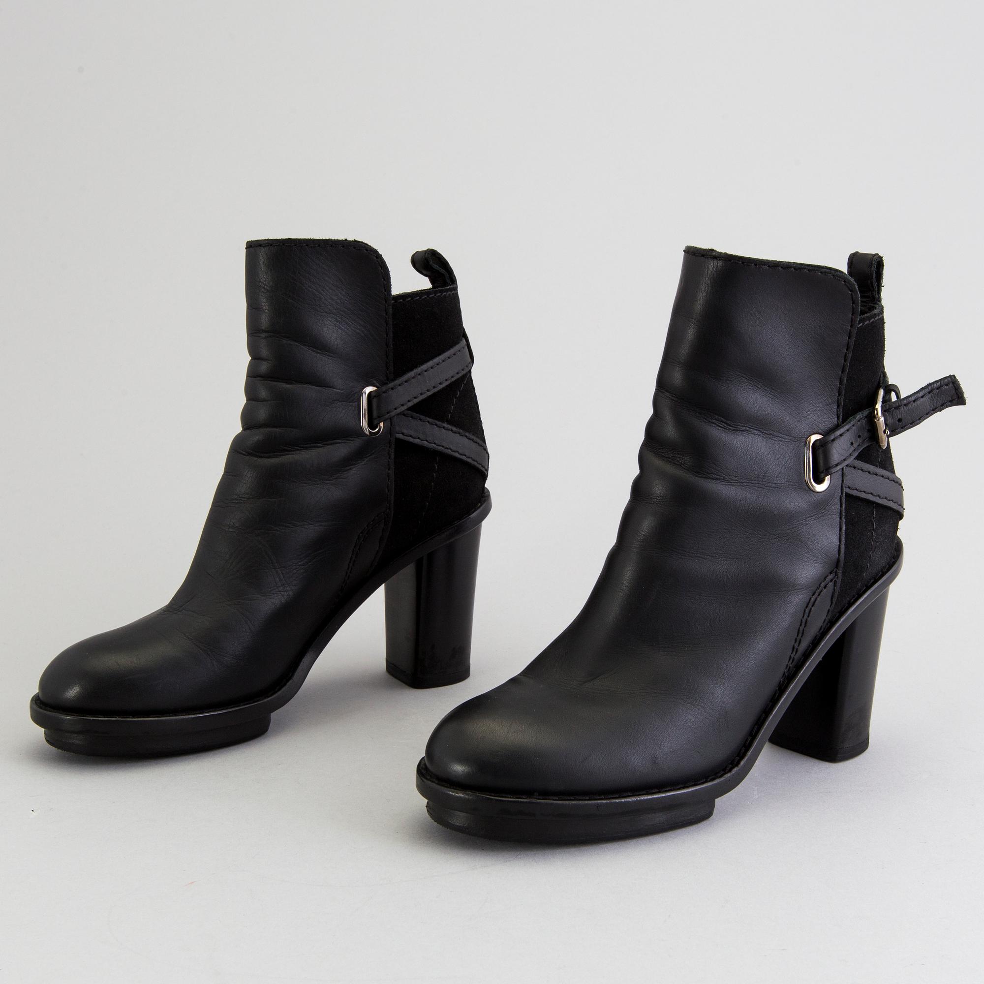 A pair of Acne boots, size 40.