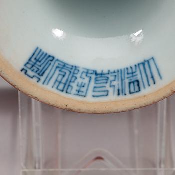 A pair of red glazed tazzas, Qing dynasty with Qianlong sealmark in underglaze blue.